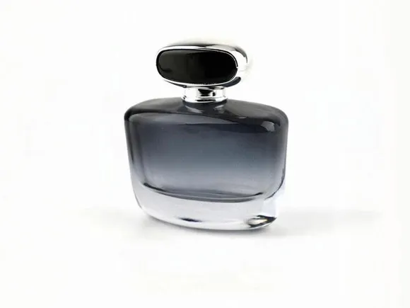 fragrance packaging decoration on a single blank glass bottle before print and coating are applied