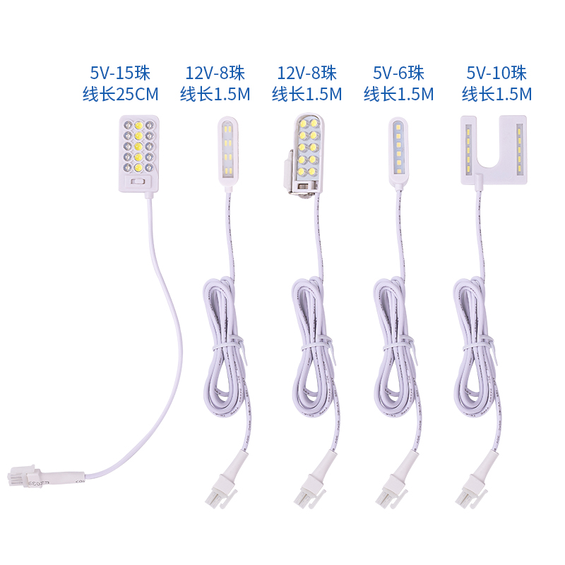 Person standing in a factory with machinery in the background