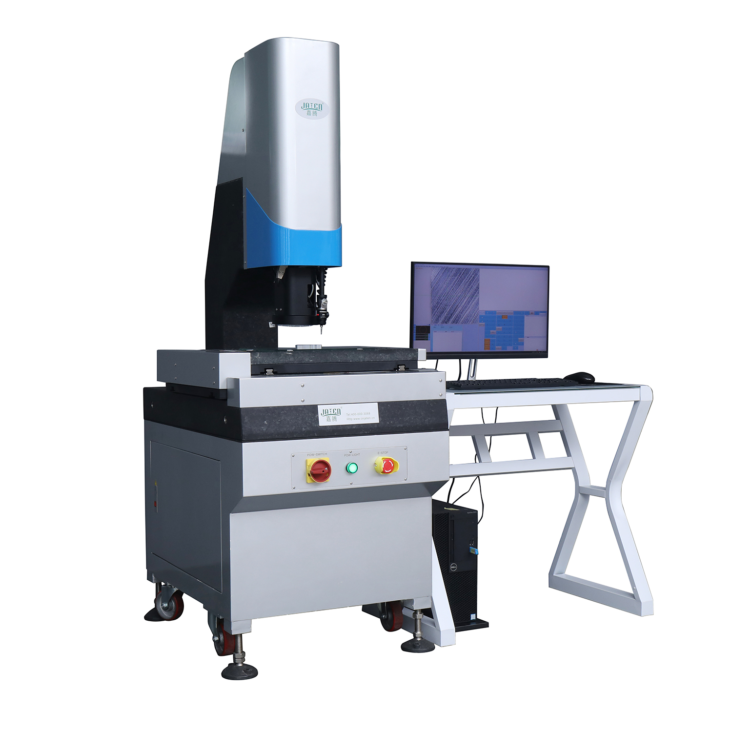 Person standing in a factory with machinery in the background