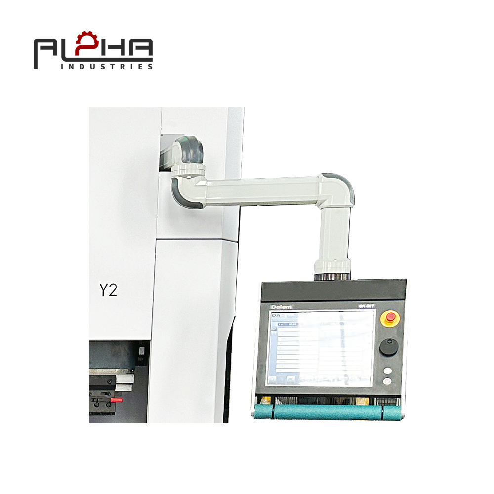 Person standing in a factory with machinery in the background