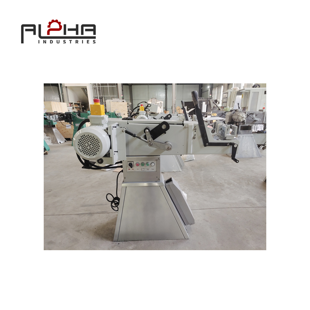 Person standing in a factory with machinery in the background