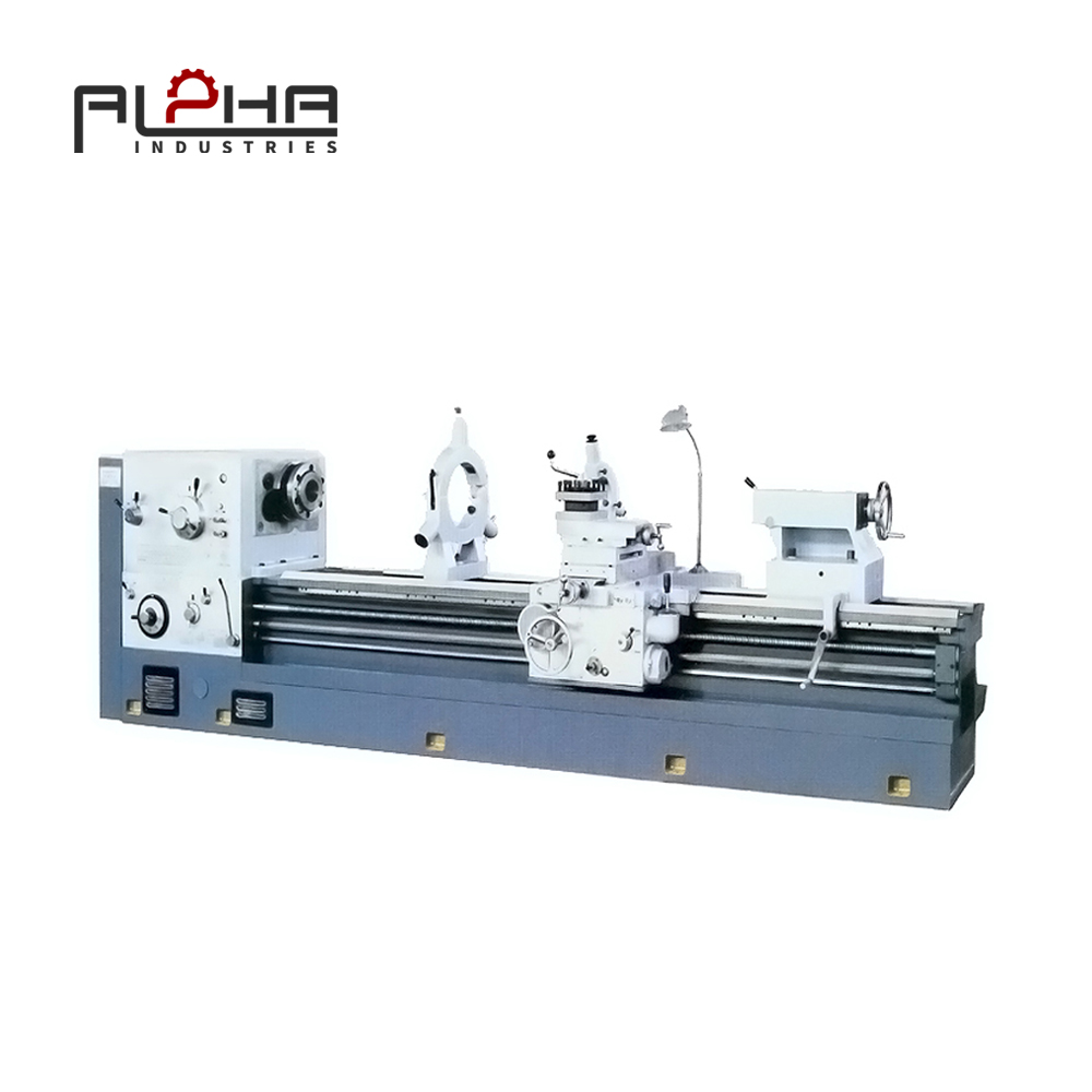 Person standing in a factory with machinery in the background