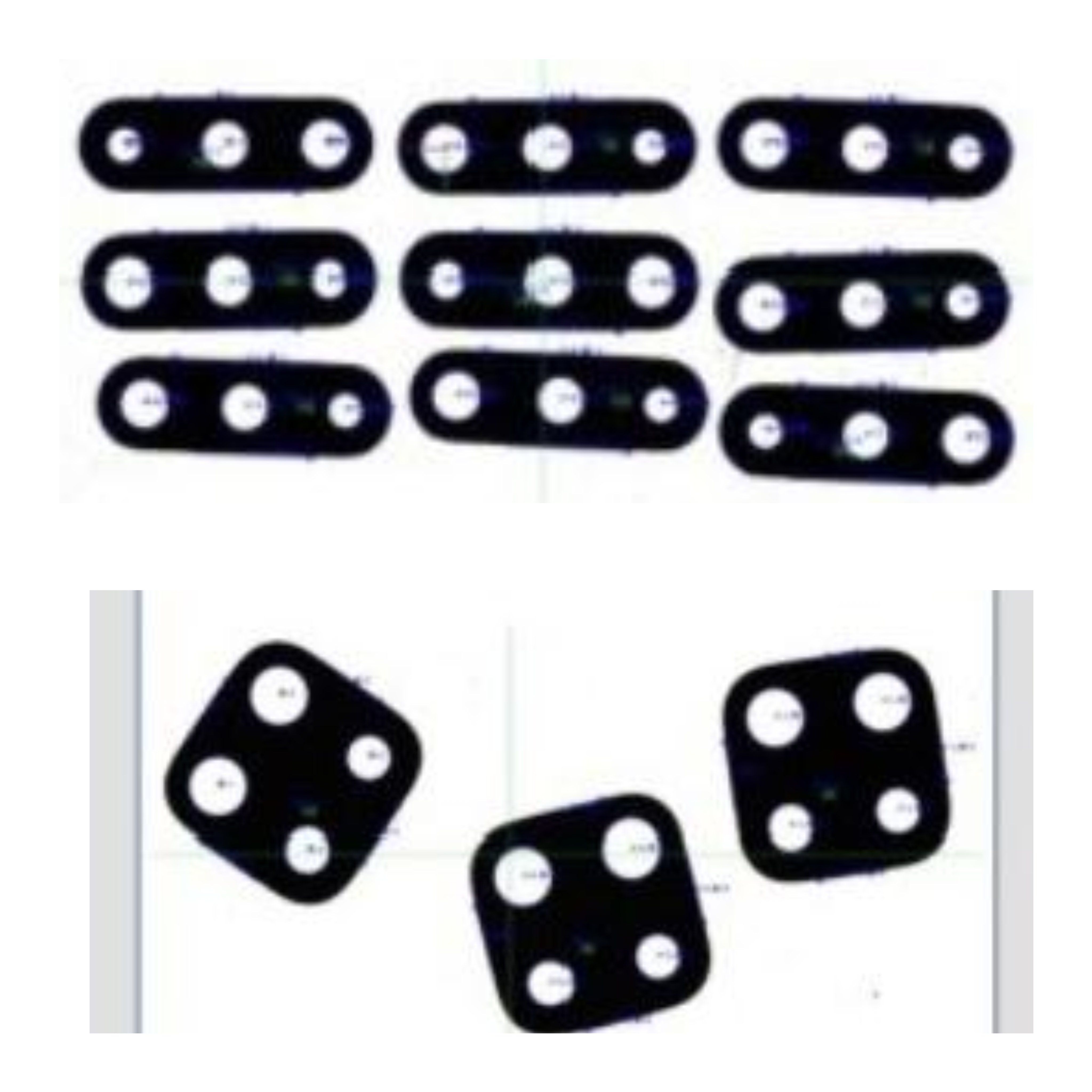 Person standing in a factory with machinery in the background