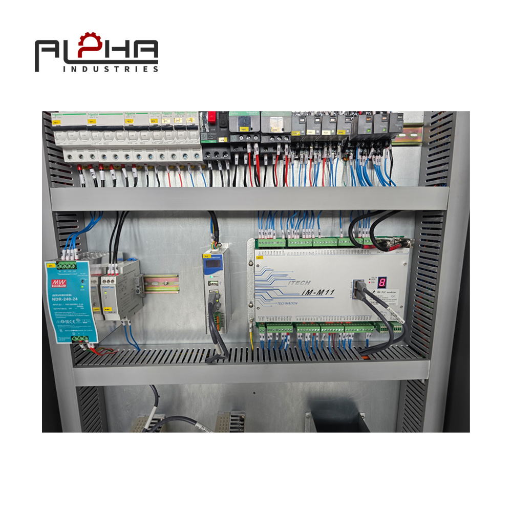 Person standing in a factory with machinery in the background