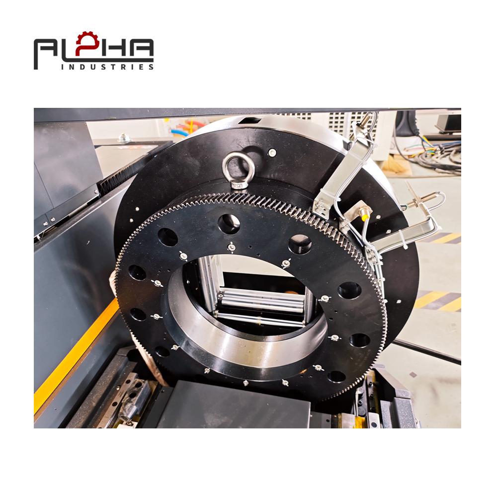 Person standing in a factory with machinery in the background