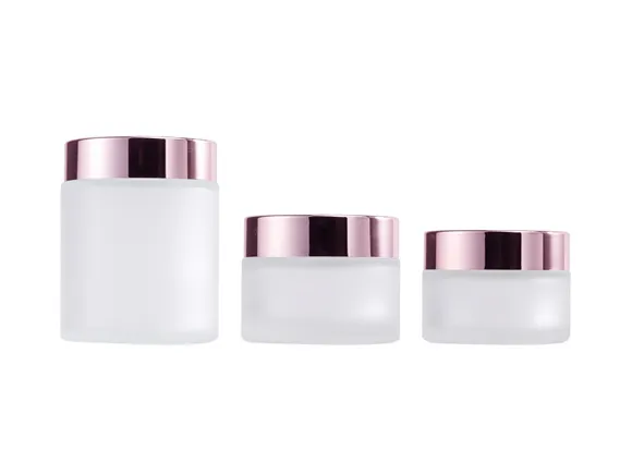 custom cosmetic jars in coordinated sizes for a skincare product family