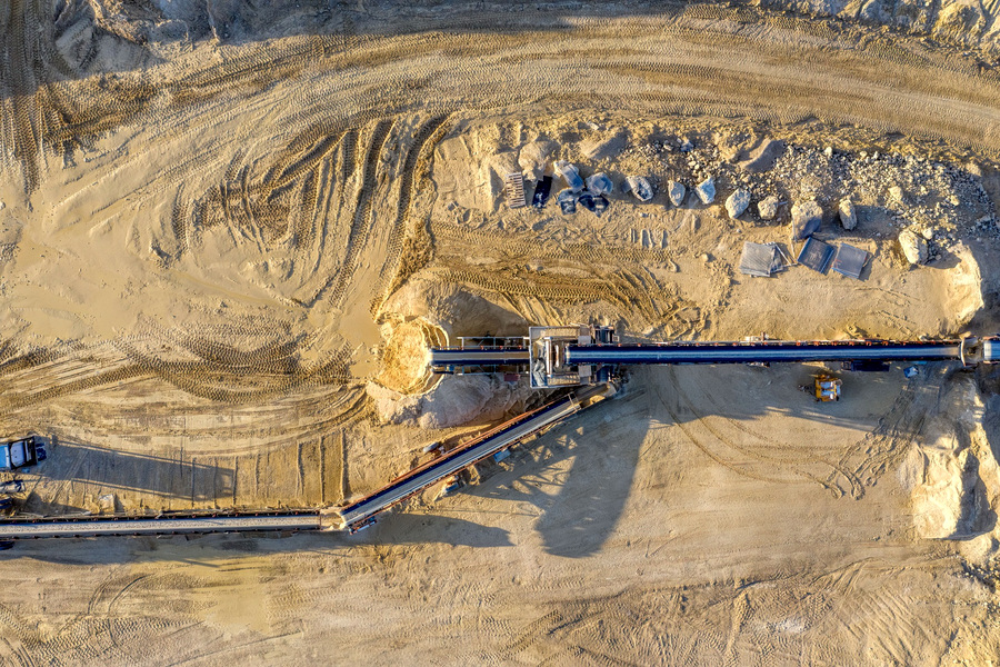 Aerial view of aggregate processing conveyors showing different conveyor positions in the plant layout