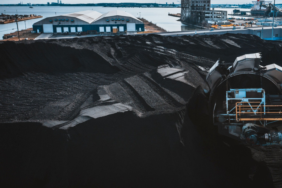 Port bulk material handling yard with conveyor equipment and coal stockpile