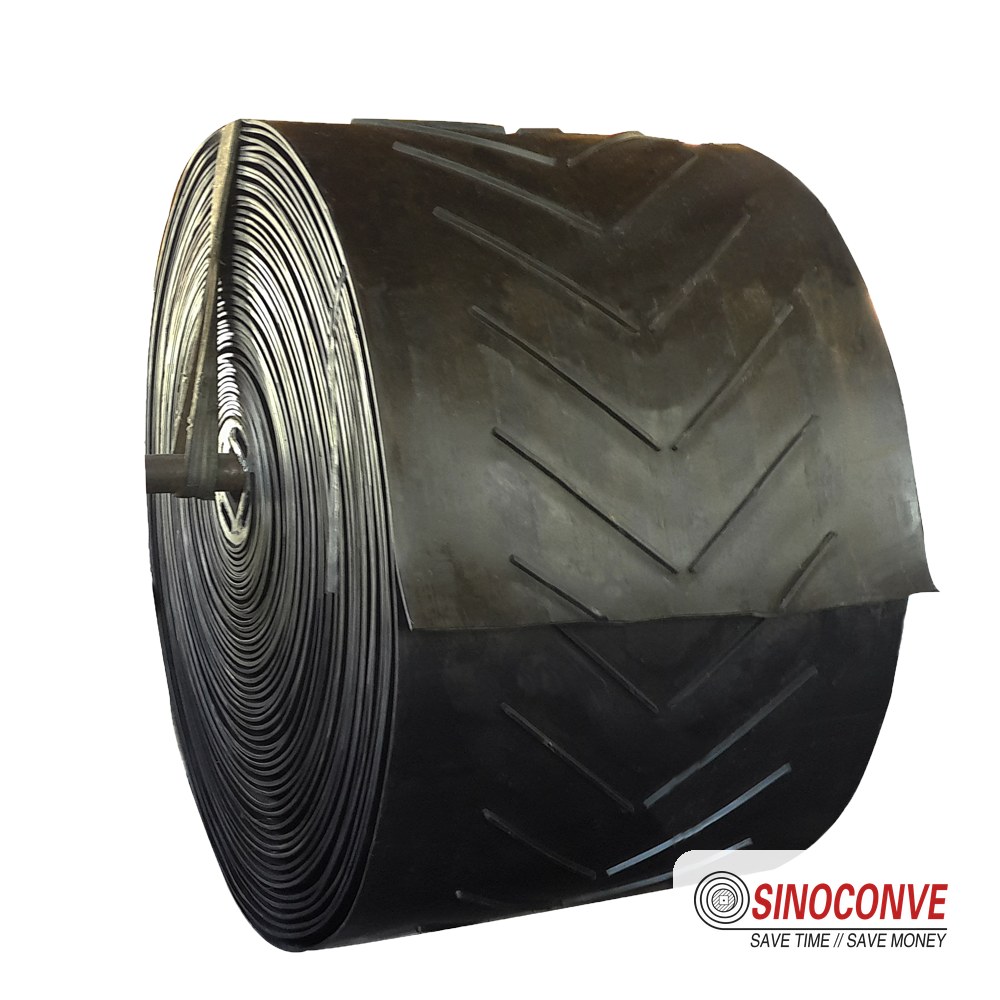 Chevron conveyor belt roll with V-shaped cleats