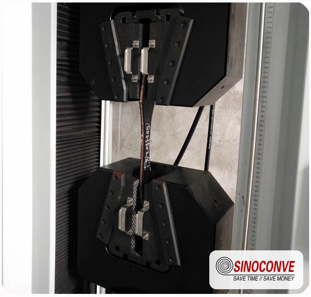 Tensile test on a conveyor belt jointing sample measuring splice strength before dispatch