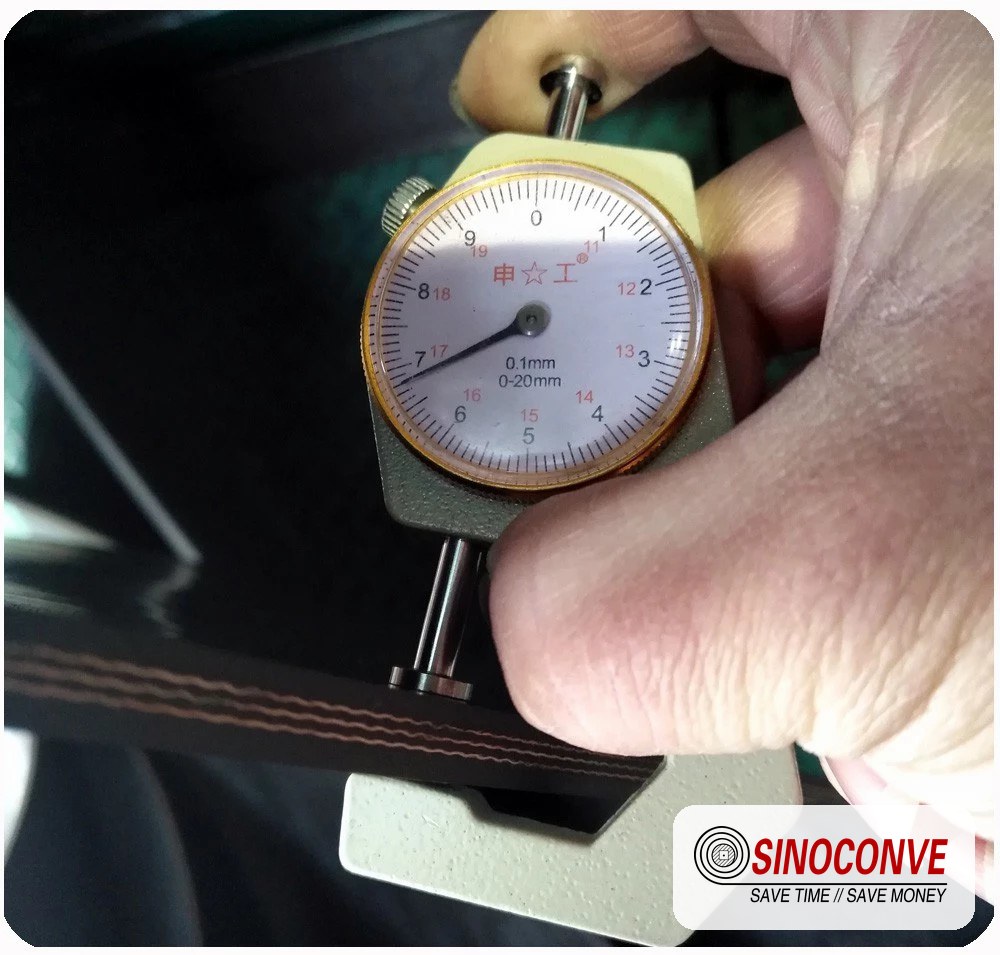 cover rubber thickness check on a heat resistant conveyor belt at the factory before shipment