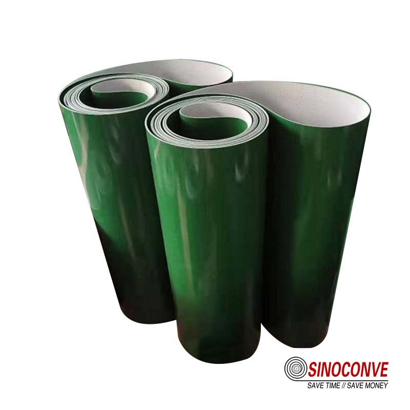 Drainage channel and floor fall beneath a food packaging conveyor section