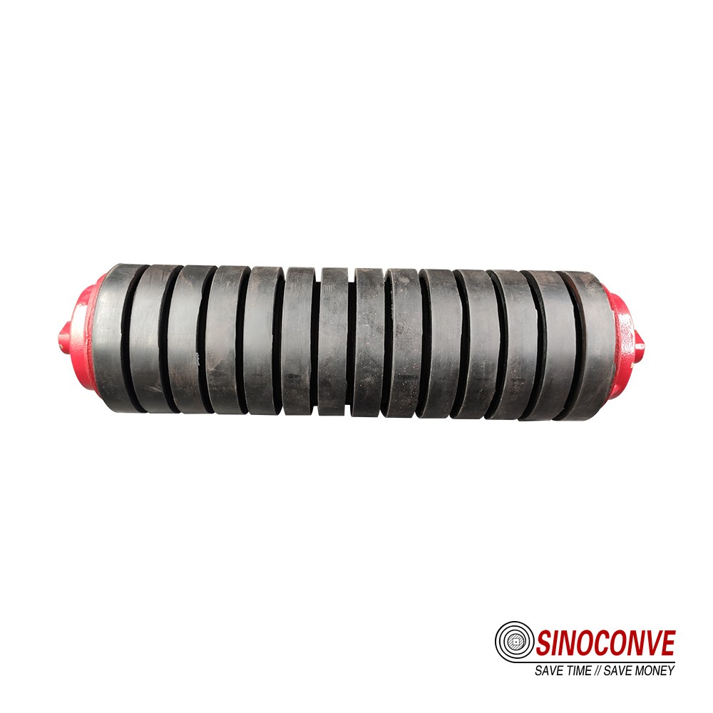Self-aligning idler roller at an angle on a conveyor frame correcting belt tracking