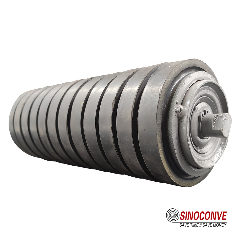 spiral return roller used to shed carryback