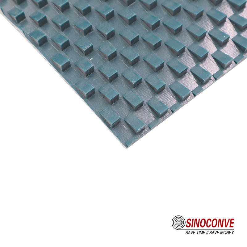 teal conveyor belt with a raised square stud pattern
