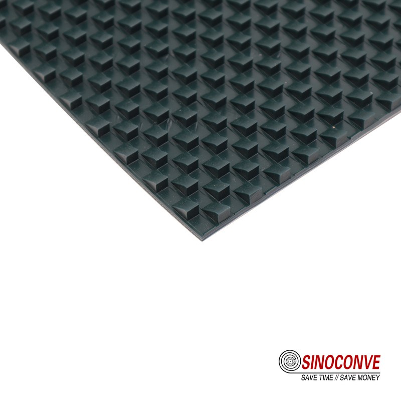 plastic belt surface with a moulded raised diamond pattern