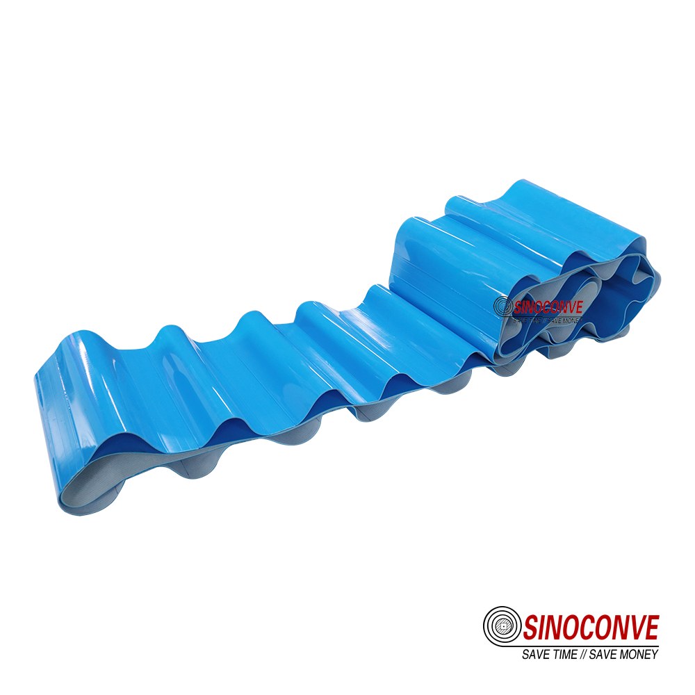 Close up of a dimpled beverage conveyor belt surface showing the embossed texture