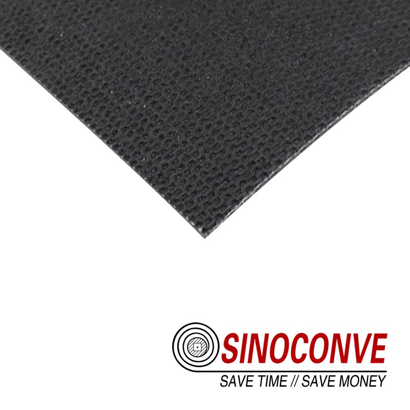 Black fine-grain PVC gypsum conveyor belt cut edge showing the carcass construction