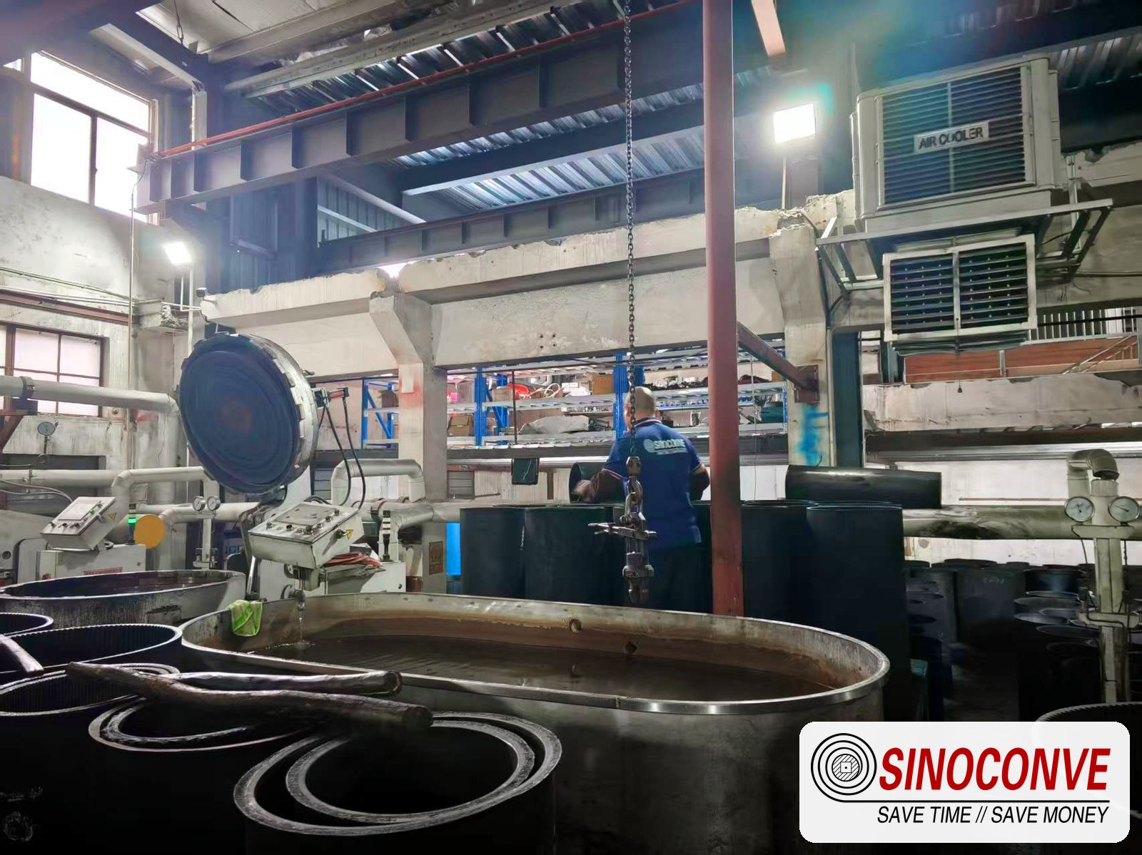 Conveyor belt splice press in a workshop