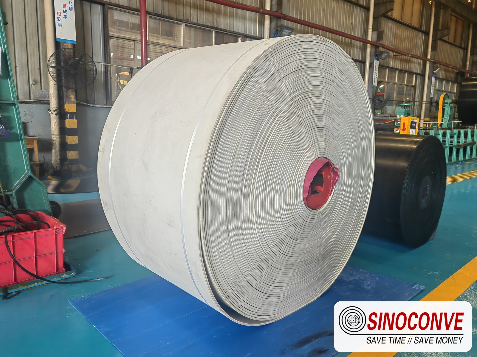 White food-grade belt roll in the plant that supplies sugar conveyor belts