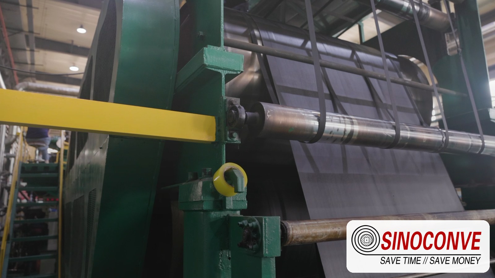 Belt running through a calender at the plant that builds copper ore conveyor belts